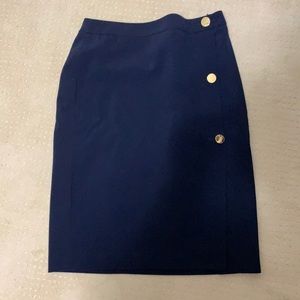 Navy blue Ann Taylor skirt size 6 with front slit. Perfect for work!